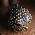 Blowfish made of ceramics, sea creature of sphere shape, coastal style interior decor with cute face, ocean sculpture, globefish bronze